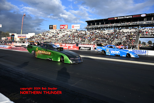 Chris Morel (near lane) vs 
John Force (far lane)